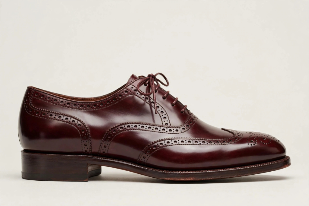 Burgundy shell cordovan Alden longwing blucher dress shoe with brogue detailing