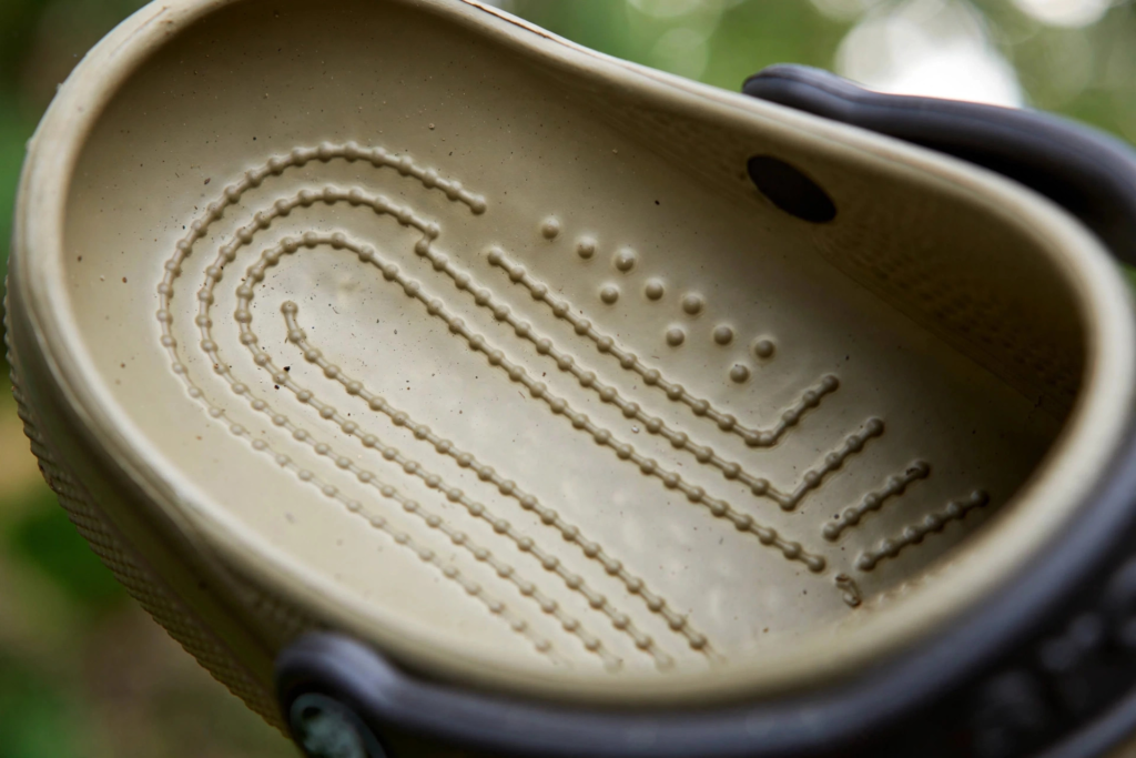 Close-up of a Crocs contoured footbed showing arch support for plantar fasciitis
